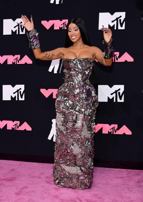 Cardi B attends the 2023 MTV Video Music Awards. she wore a metallic dress